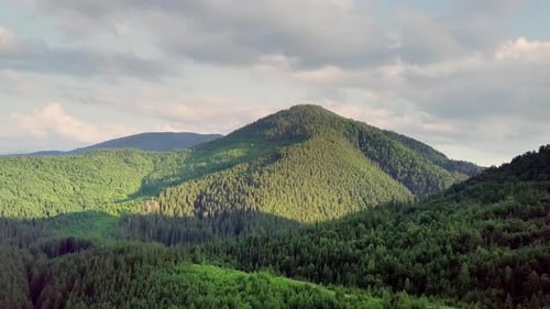 Mountain Peaks and Morning Sky with Smooth Moving Clouds
