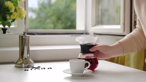 Pouring Fresh Coffee in Bright Morning Light