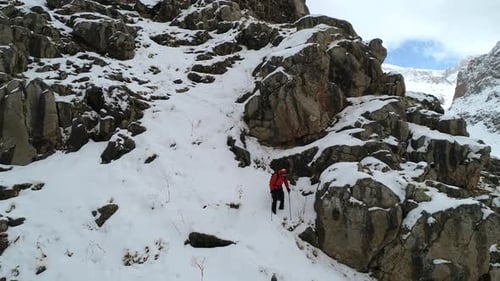 Snowy Mountain With Walking Sticks