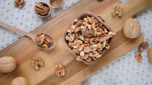 Trendy Top View Flat Lay With Healthy Food, Walnuts In Wooden Bowl.