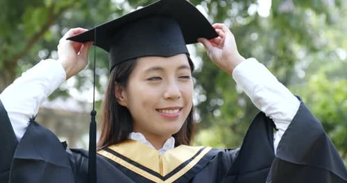 Happy woman university graduation day