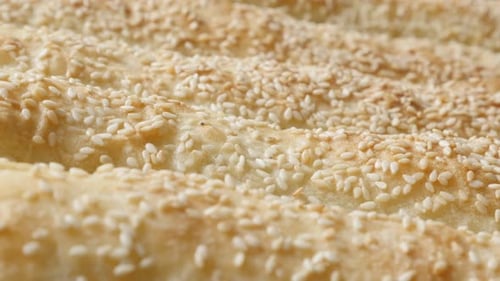 Pita Bread Covered With Sesame Seeds Close Up
