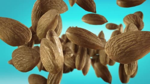 Almonds Floating Against a Blue Background