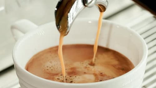 Espresso Pouring into a Mug, Close Up
