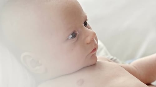 Baby Boy Looking Around