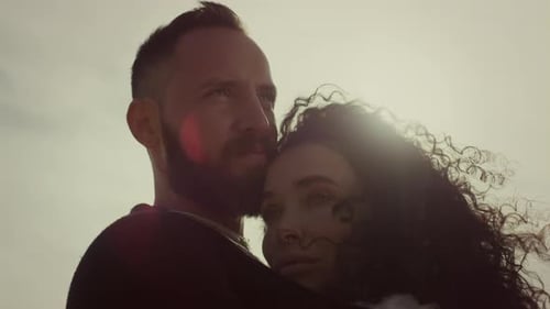 Affectionate Couple Embracing in Natural Light