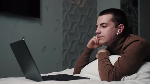 Calm Young Man Enjoys Listening Chill Music Audio Sound Meditating Feeling No Stress at Home