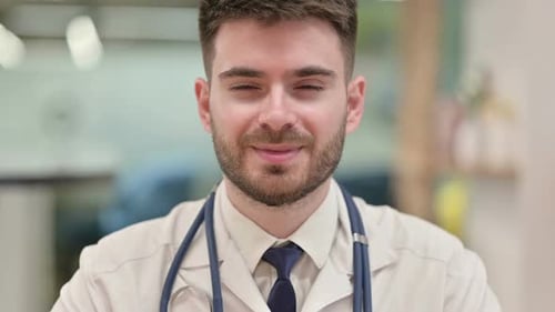 Doctor Smiling Close Up in Hospital Setting