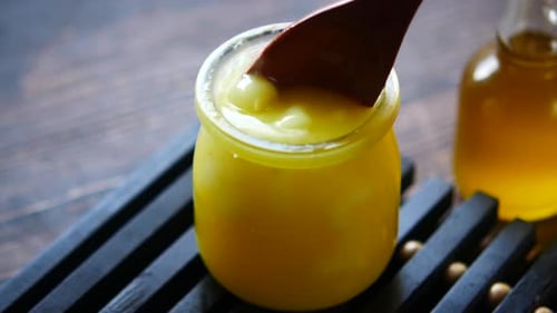 Homemade Ghee in Container on a Table