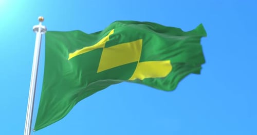 Abstract Green and Yellow Flag Waving in Blue Sky