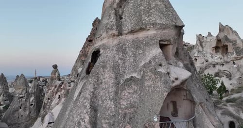 Aerial View of Natural Rock Formations in the Sunset Valley with Cave Houses in Cappadocia Turkey