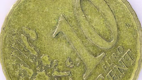 ten euro cent coin extreme close up, macro shot. 1 euro coin very close detail view over withe backg