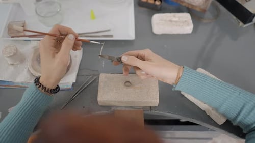 Jeweler Working At Her Workshop Close Up