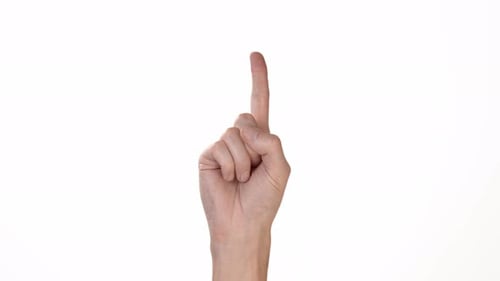 A Man's Hand on a White Background of Isolate Shows a Finger That Denies. Place To Insert Text or