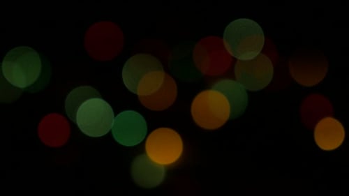 Twinkling Colorful Bokeh Lights on Black Background