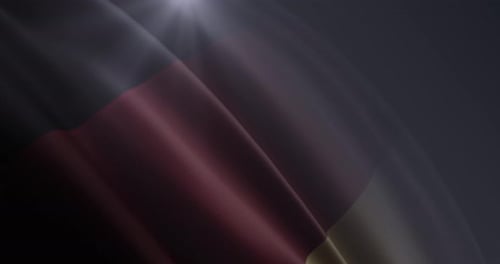 Seamless Loop of Waving German Flag with Light Rays