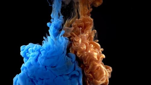 Blue and Gold Ink Plumes Swirl