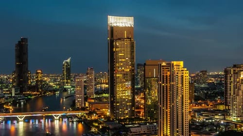 Time Lapse Night Cityscape and Highrise Buildings in Metropolis City Center