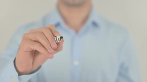 Hand Writes 'Working Time' on Clear Surface