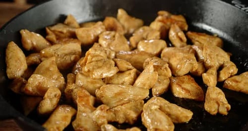 Close up of Delicious Glazed Chicken being Cooked