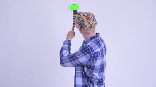 Happy Young Hipster Man Vlogging with Phone