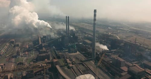 Industrial Complex Emitting Smoke Aerial View