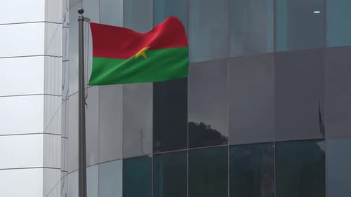 Animated Burkina Faso Flag Waving on Modern Building