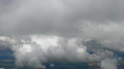 Flying Above the Clouds. Skyscape with Cloud From the Plane Window Midair. Spectacular View From the