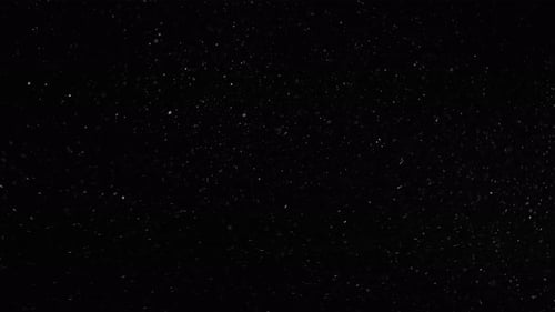 Dynamic White Particles on Black Background