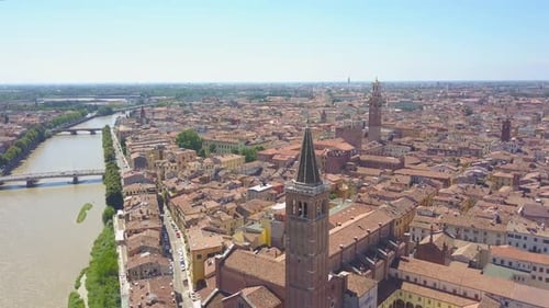 Panoramic aerial drone view of Verona,Italy.Drone rises filming panorama of old city and Adige river