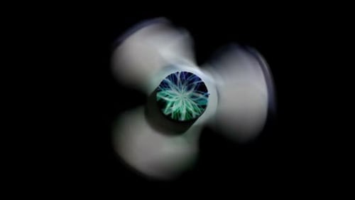 Fidget Spinner Spinning Fast Close Up on Black