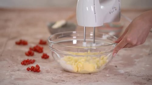 Mixing Butter and Sugar with Electric Mixer
