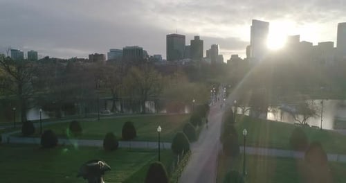 George Washington Statue and Boston Skyline at Sunset