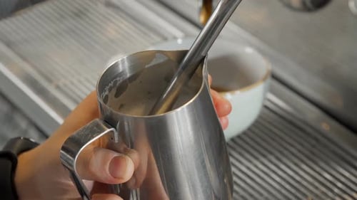 Cropped Shot of Milk Being Steamed for Delciious Cappuccino