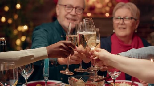 Festive Friends Toasting Champagne at Christmas Dinner