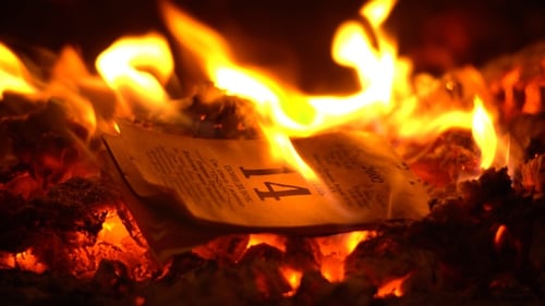 The tear-off calendar burns beautifully in fire closeup