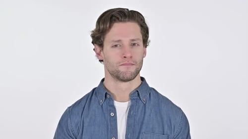 Man Shakes Finger No on White Background