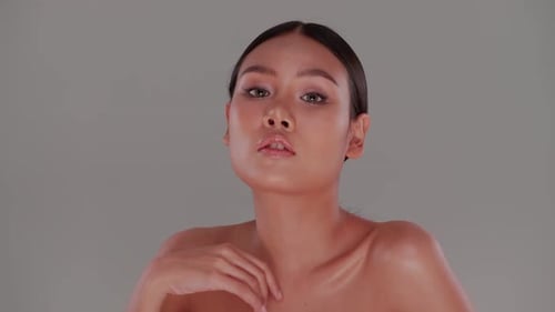 Beautiful Young Woman Posing in Studio Setting