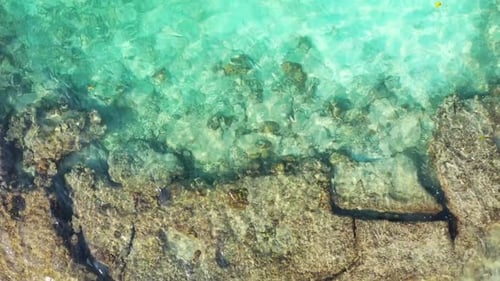 Aerial flying over texture of perfect seashore beach lifestyle by shallow lagoon with white sand bac