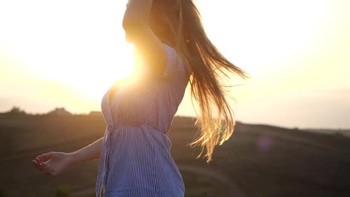 Close Up Portrait of Smiling and Joyful Feminine Girl Looking To Camera in Rural Landscape