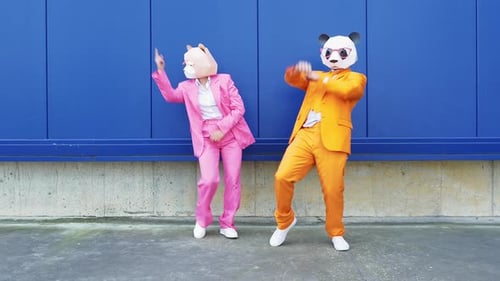 Masked Dancers Perform on City Street