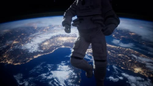 Astronaut Floating Above Earth at Night in Space