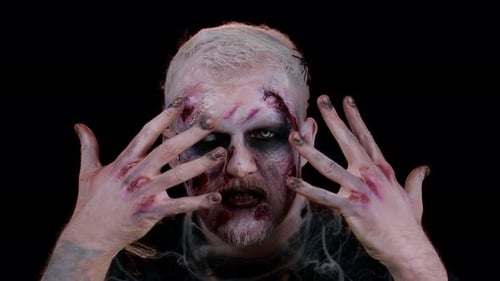 Man with Special Effects Halloween Makeup Close Up