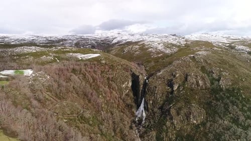 Waterfall in Winter in the Snow. Winter Landscape