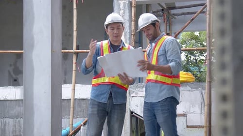 Construction Site: Engineers Review Building Project