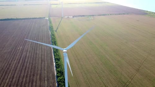 Wind Turbine Produces Clean Alternative Energy in Field