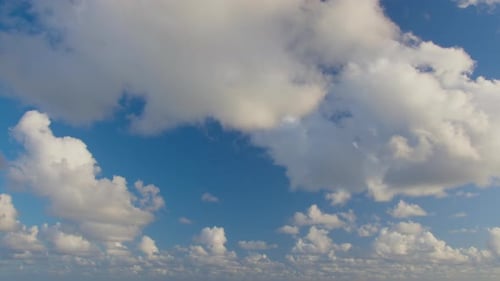 Clouds Drifting Across Blue Sky During Daytime
