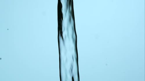 Water Stream Pours with Splashes and Bubbles