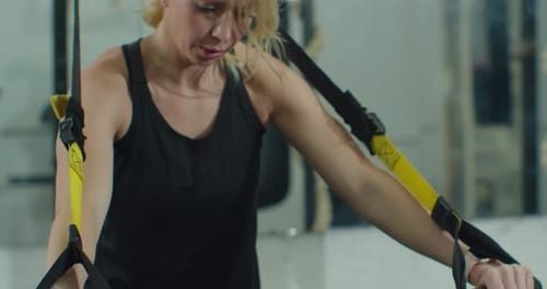 Woman Doing Resistance Training in Gym