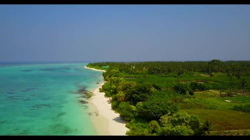 Aerial drone shot seascape of beautiful seashore beach trip by clear ocean with white sandy backgrou